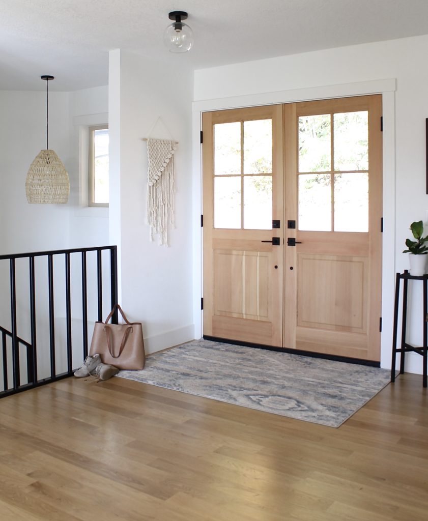 entryway with updated light fixtures