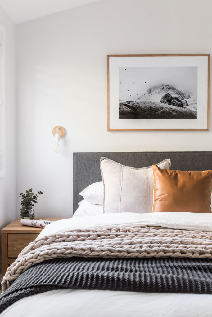 cozy bedroom with pretty throw pillows