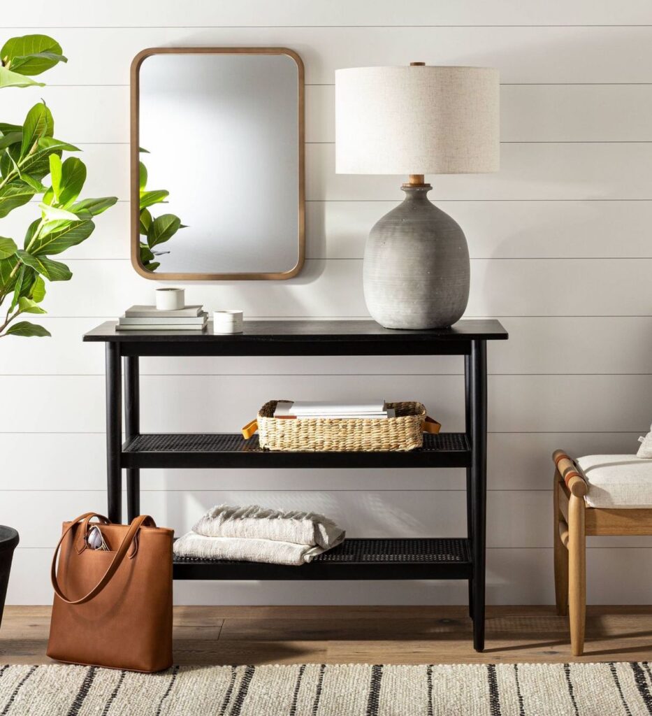 black wood and cane console table