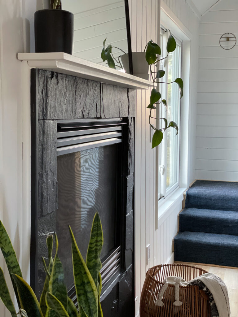 stone fireplace painted black