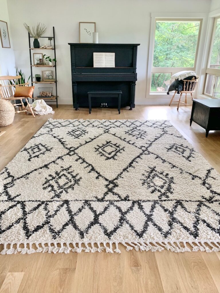 living room with large moroccan style rug