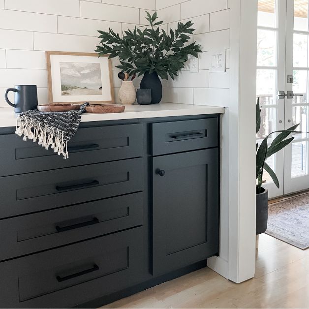 black cabinet hardware on black kitchen cabinets