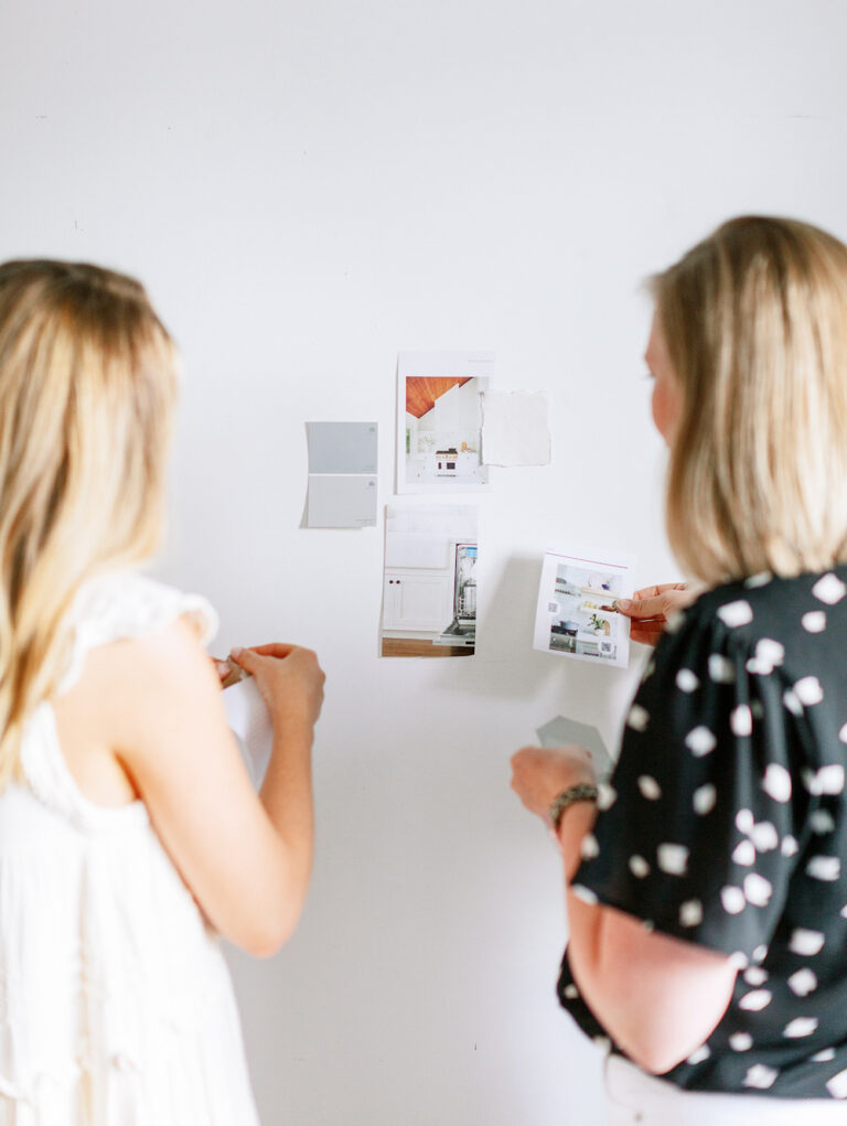 women choosing wall paint