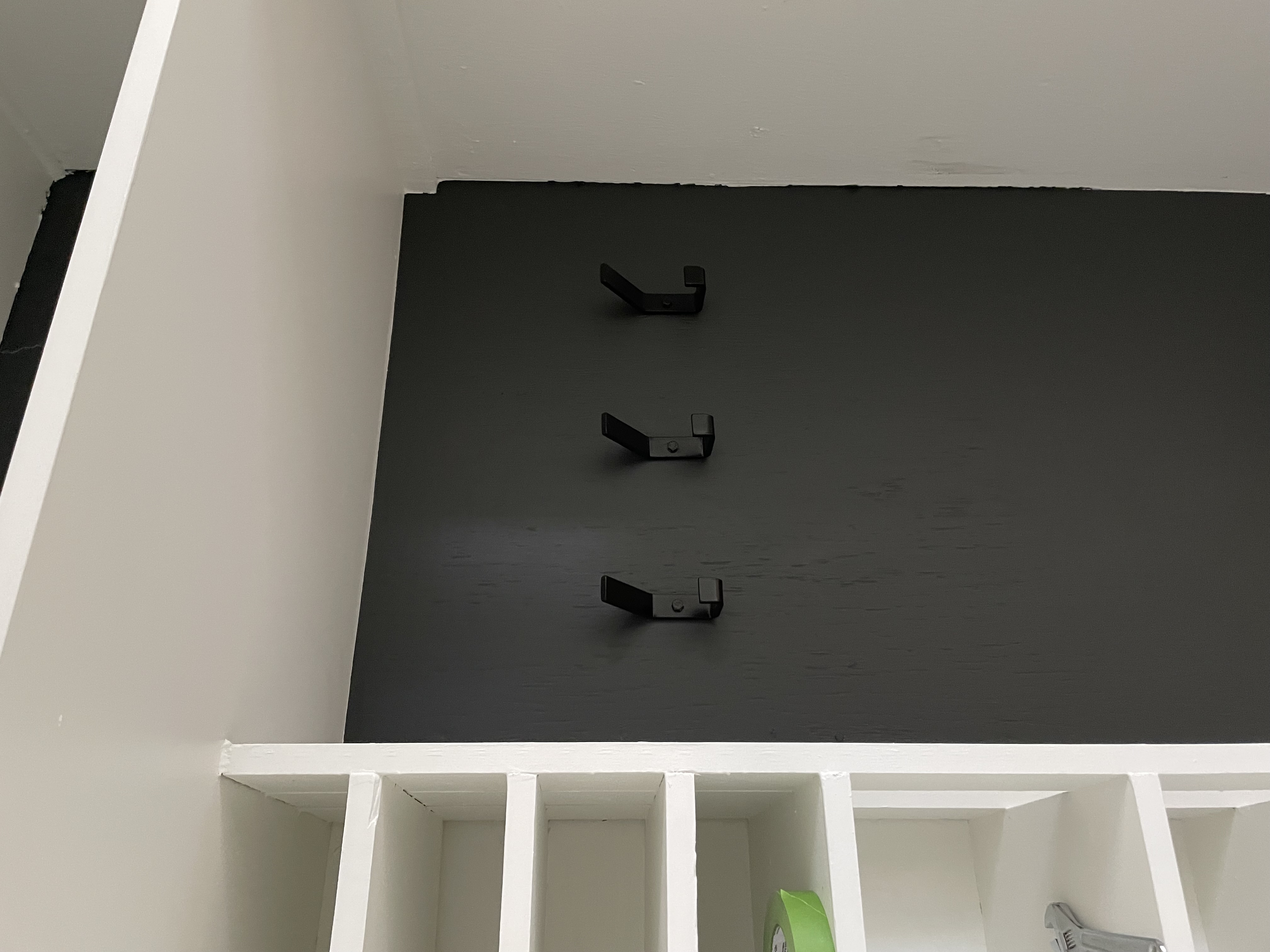 adding wall hooks to a hall closet