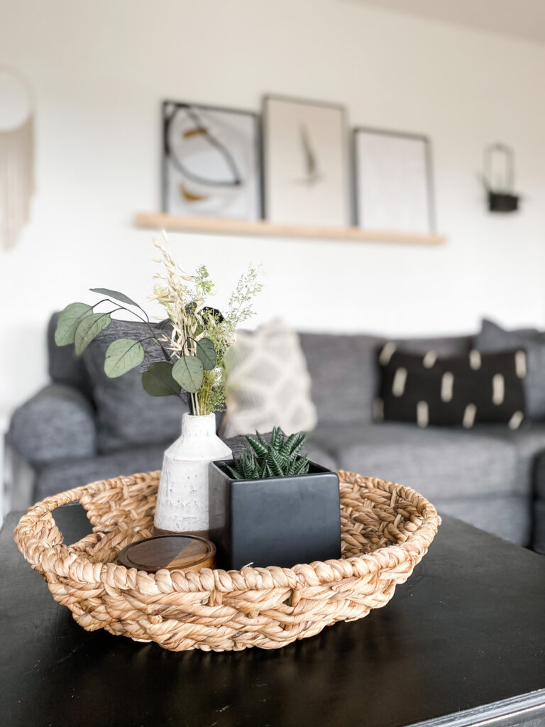 coffee table styling with basket vases and plants