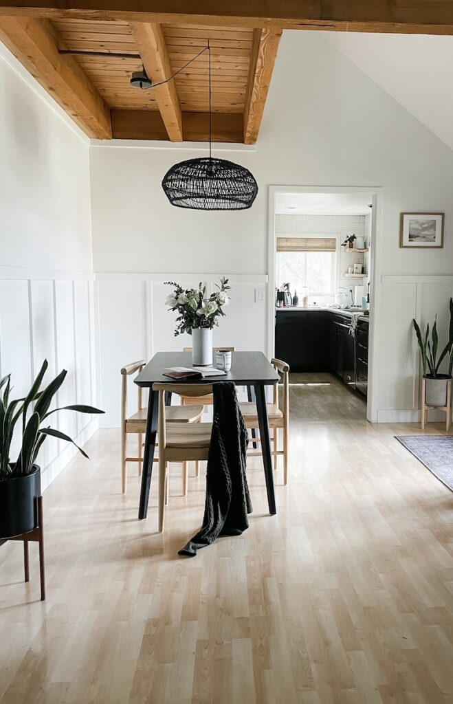 dining room with black basket light fixture