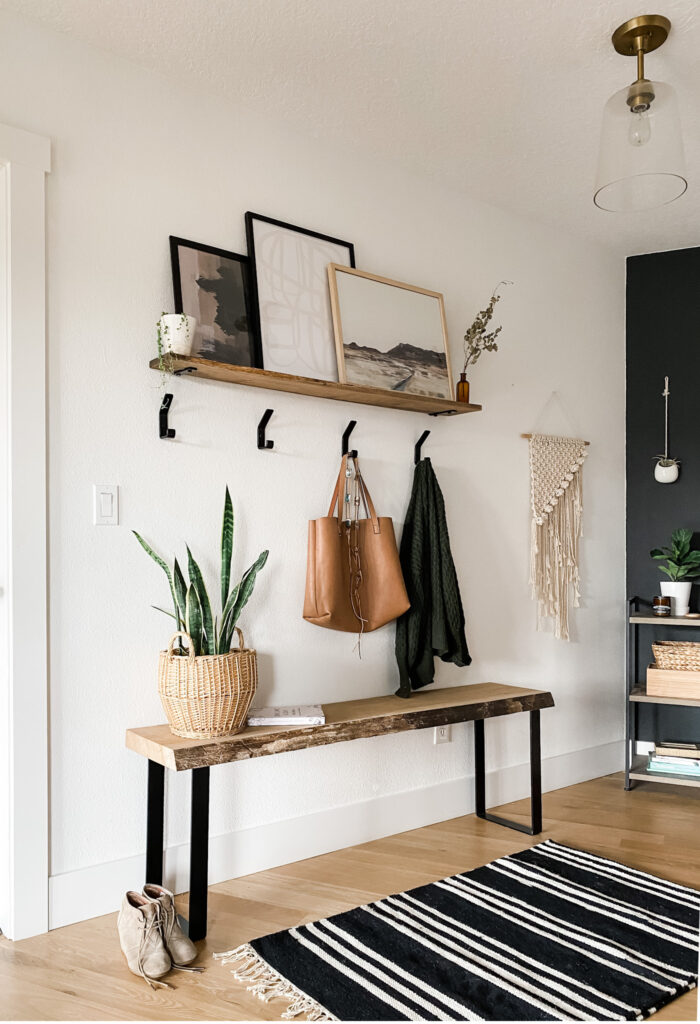 entryway way styled with online art prints