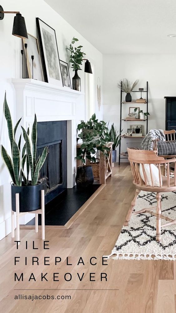 living room with painted fireplace and wood floors