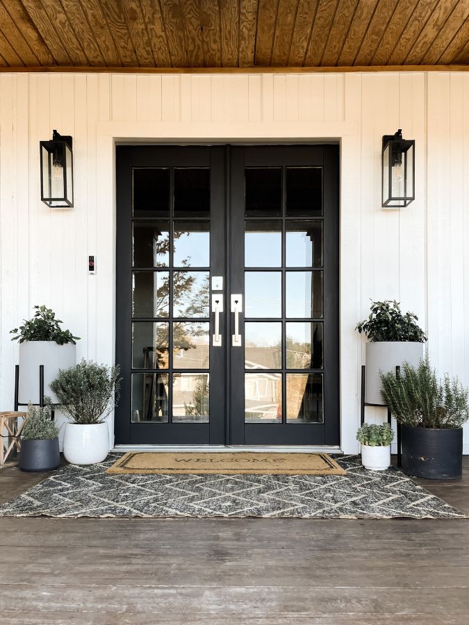 updated black front doors on big porch