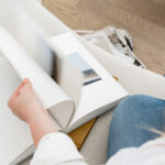 woman browsing through book
