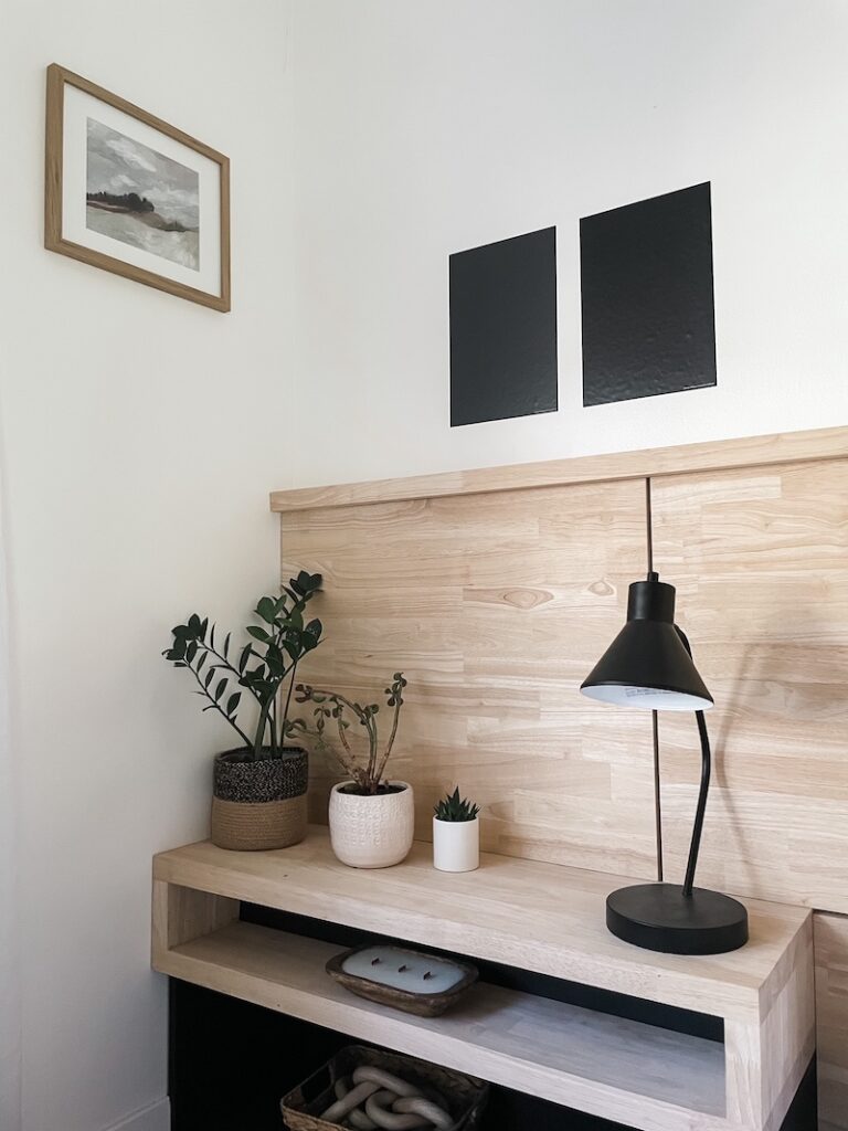 bedroom with black paint samples