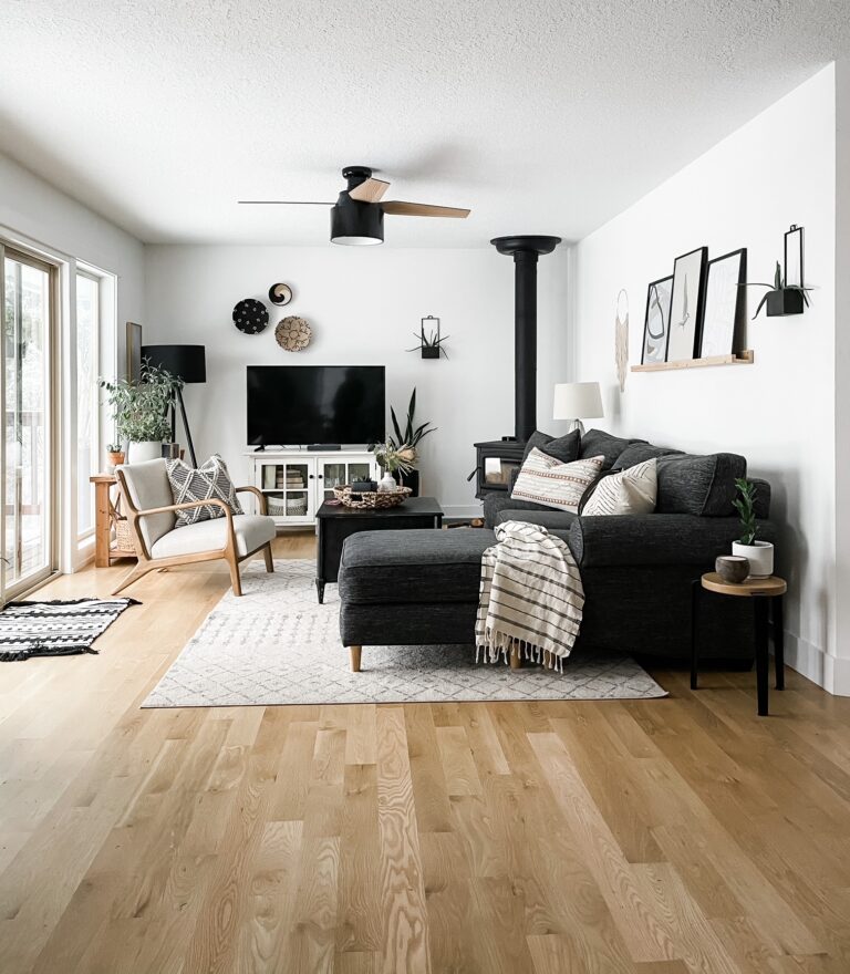 living room with basket wall art