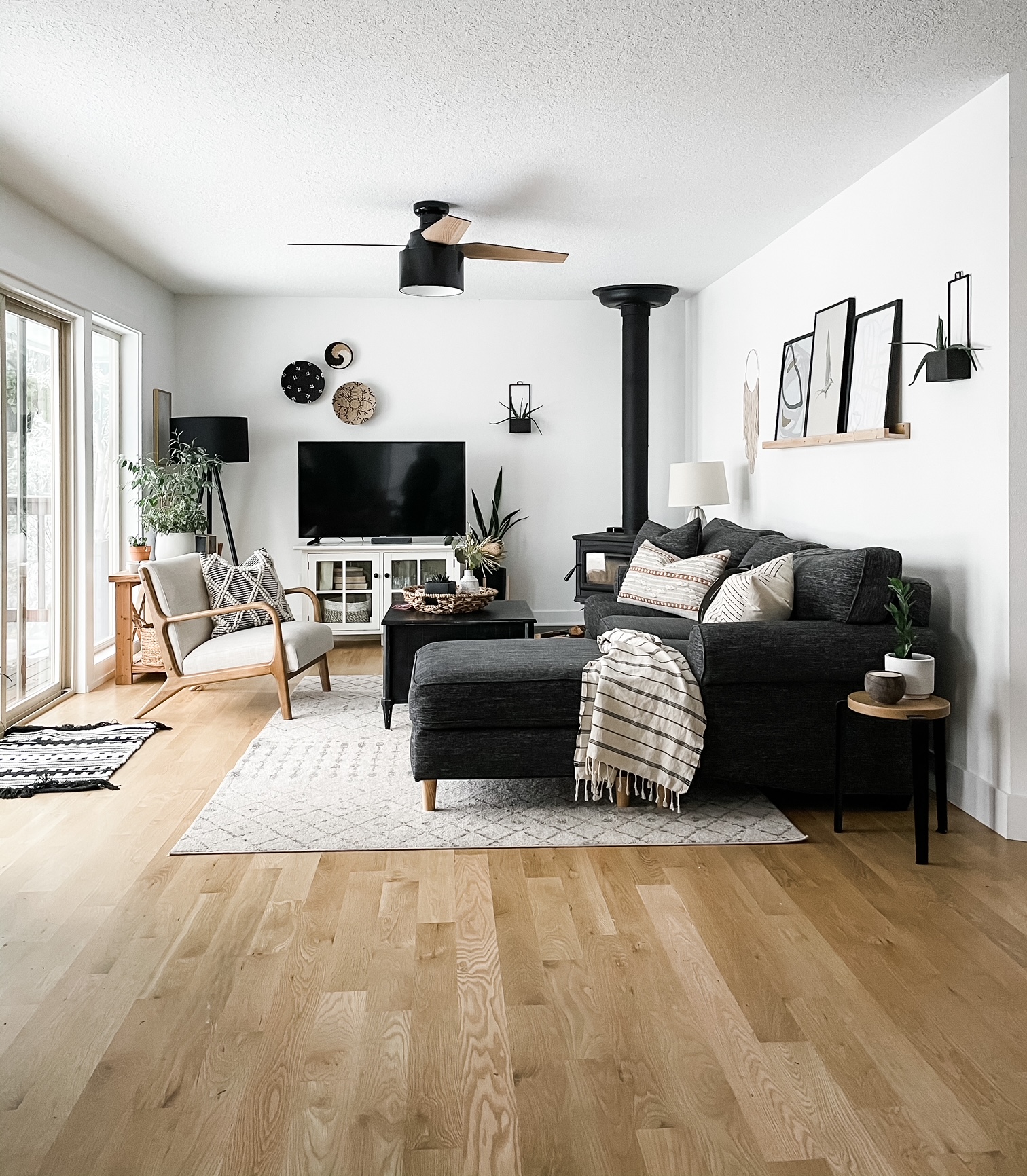 living room with basket wall art