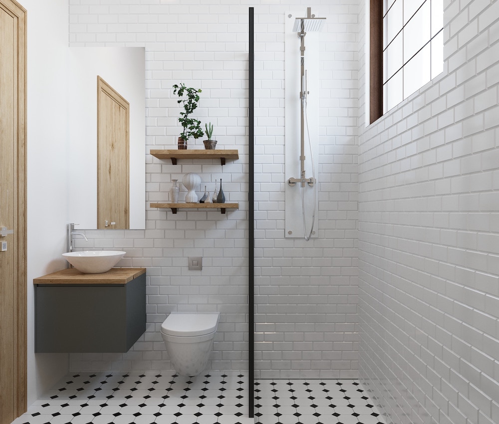 modern black and white bathroom with subway tile backsplash, floating vanity, and wood elements