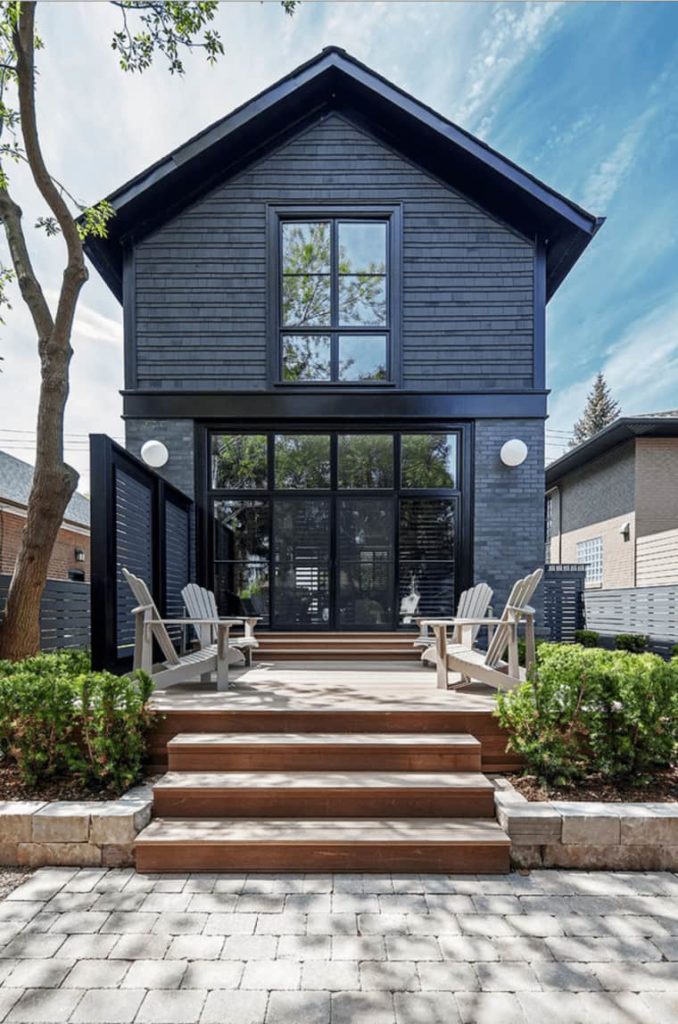 modern house with dark gray paint and accents