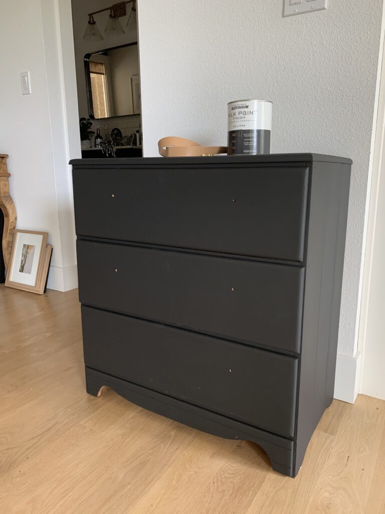 small dresser painted black with milk paint