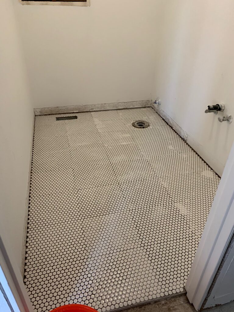 penny tile floor installation