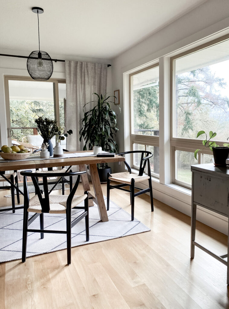 how to style house plants tip: use tall plants to add height to empty spaces