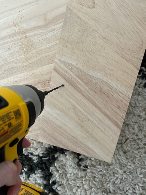 drilling holes for wood bench DIY
