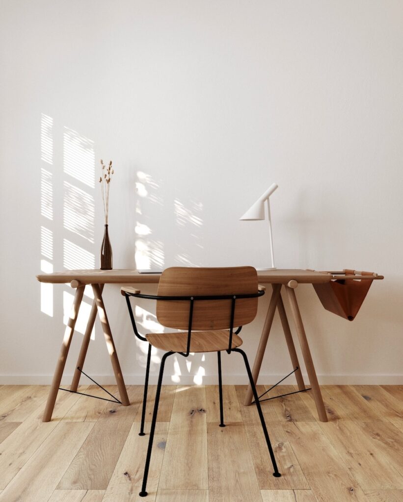 scandinavian style with light wood desk, chair, and light colors