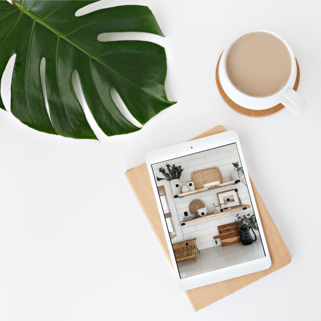 ipad with coffee and plant