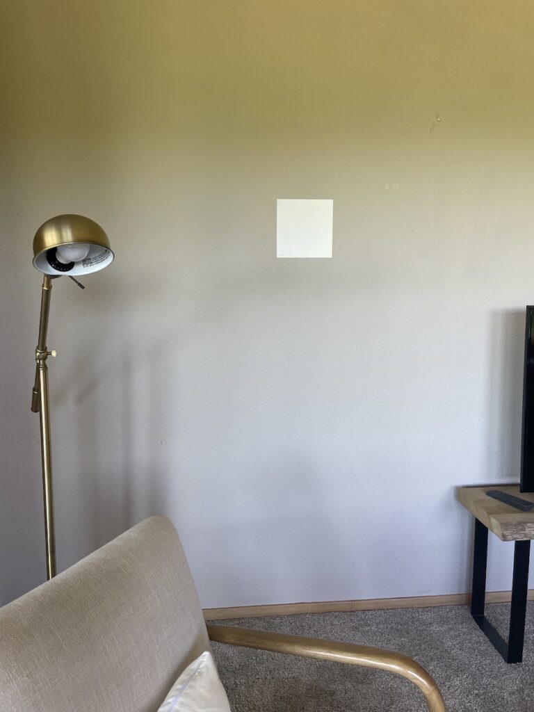 testing paint sample on wall