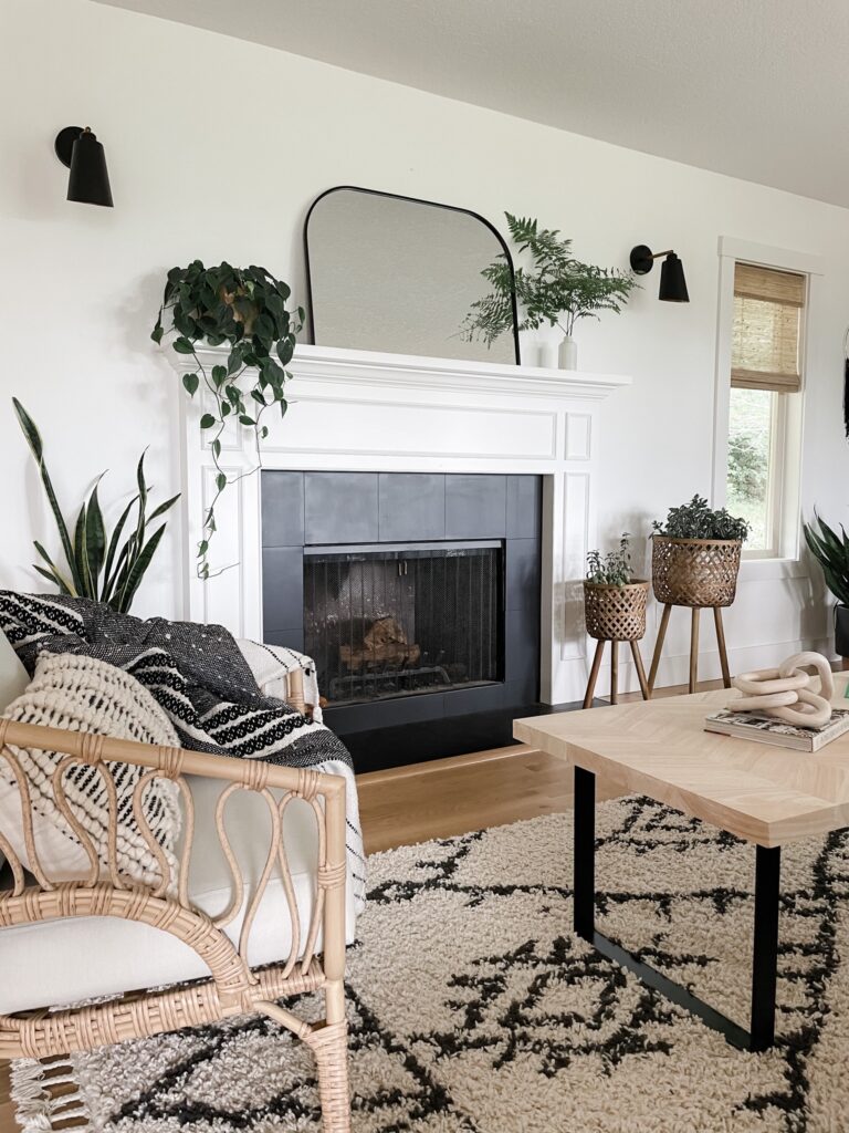 painted fireplace with black ceramic tile in modern living room