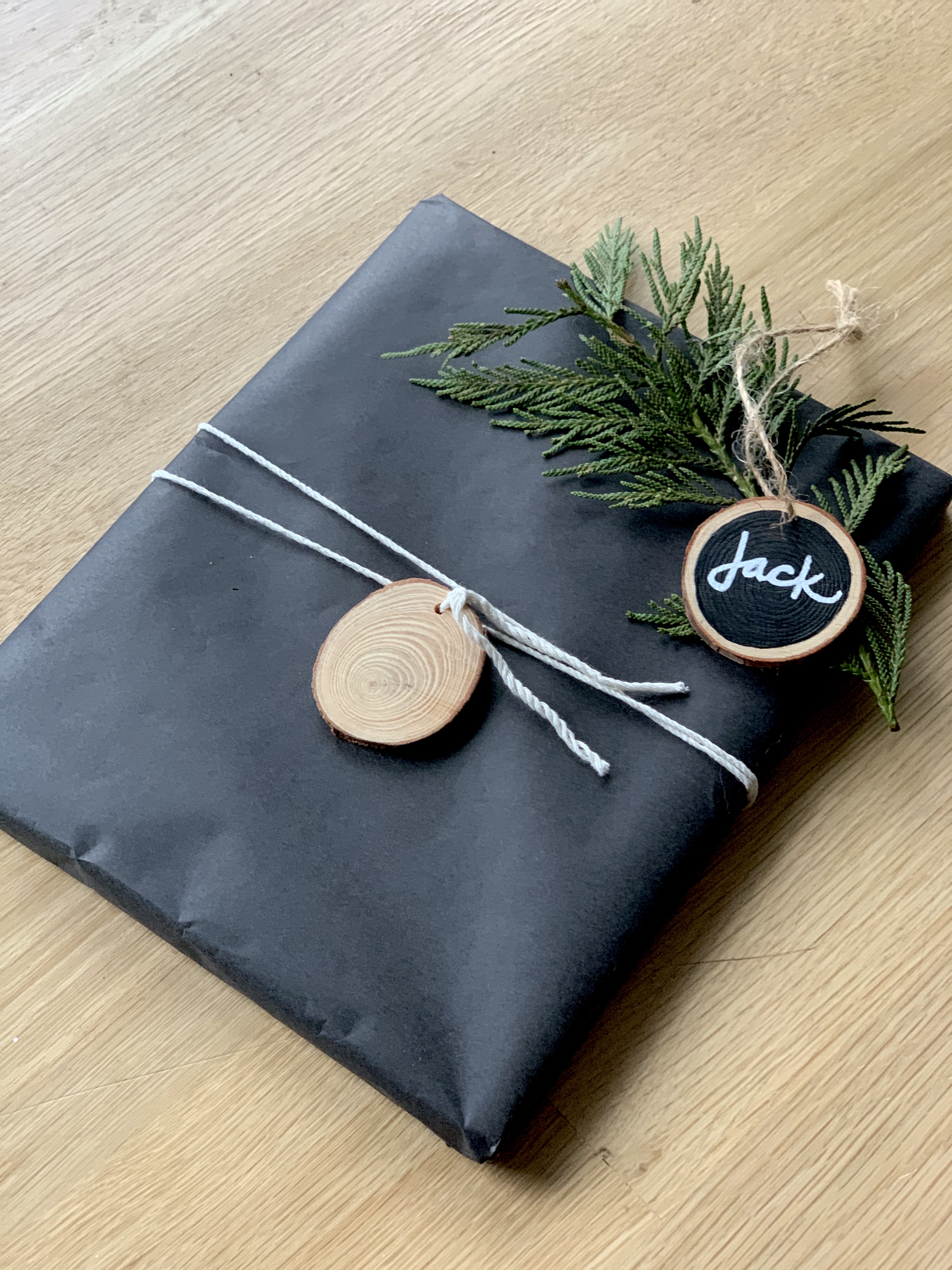 gift wrap with wood slice tags
