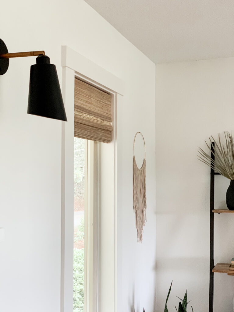small window with custom woven wood shades